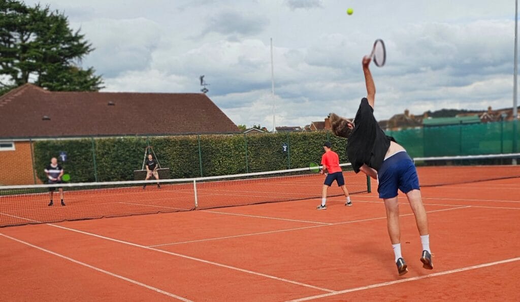 Wargrave Tennis Club Finals Day Men's Doubles Ollie Serving